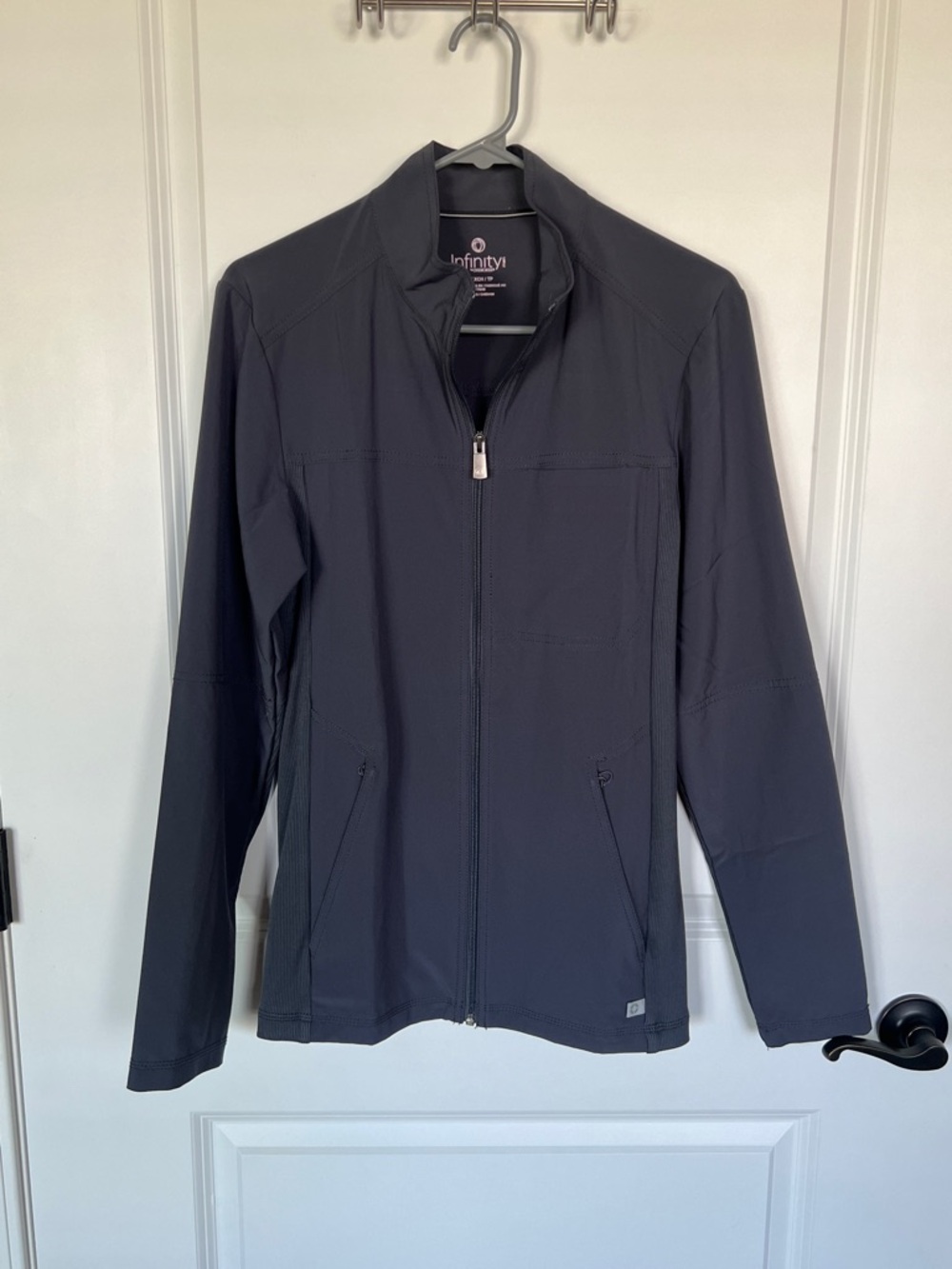 Cherokee Infinity Men’s Gray Ribbed Panel Scrub Jacket.
